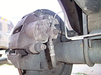 Rear brake caliper removal