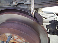 Removing rear brake rotor