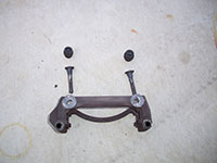 Brake caliper bracket and slide pins