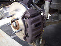 Reinstalling brake caliper