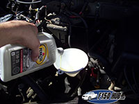 Filling crankcase with new motor oil